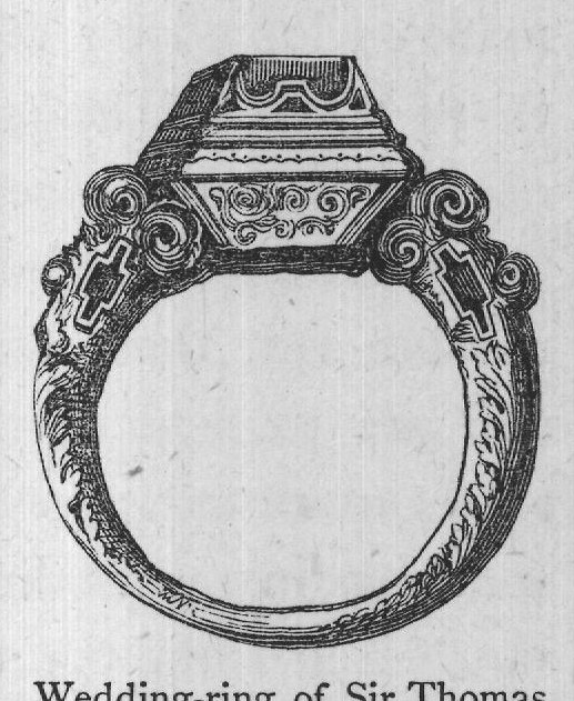 small figure of a child in gold,